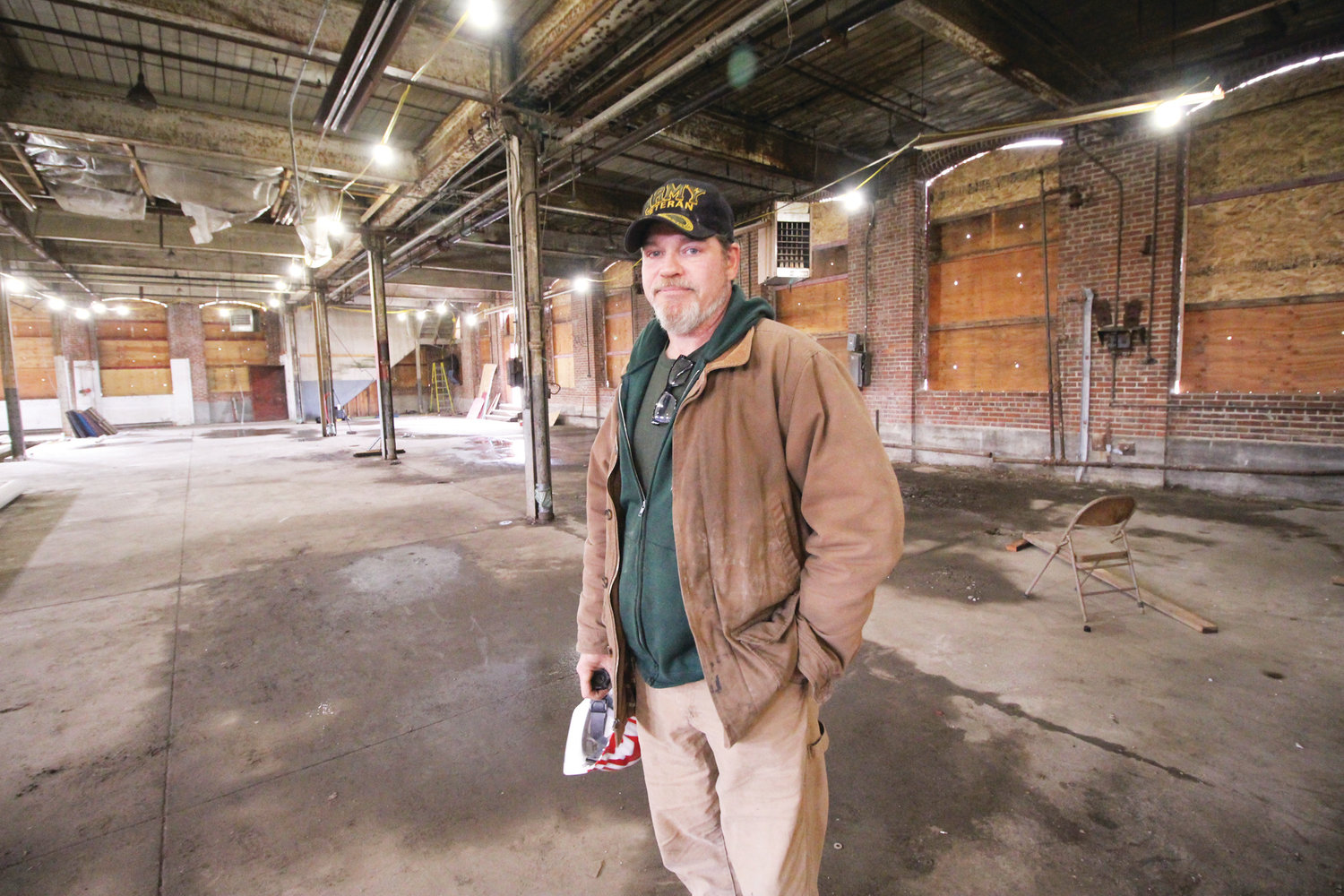 GOOD BONES: James Switzer, foreman for Case Construction, says the saw tooth building was carefully built and maintains its integrity.